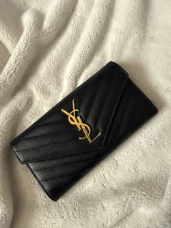 YSL Monogram large flap wallet in grain de poudre embossed leather