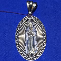 10kt YG Virgin Mary Pendant. (C-1) ASK FOR RYAN. #(contact info removed)88