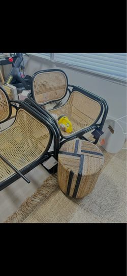 Two massive black and nature rattan accent chairs Wayfair