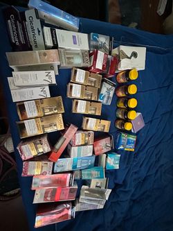 Facial product and vitamins, in good condition
