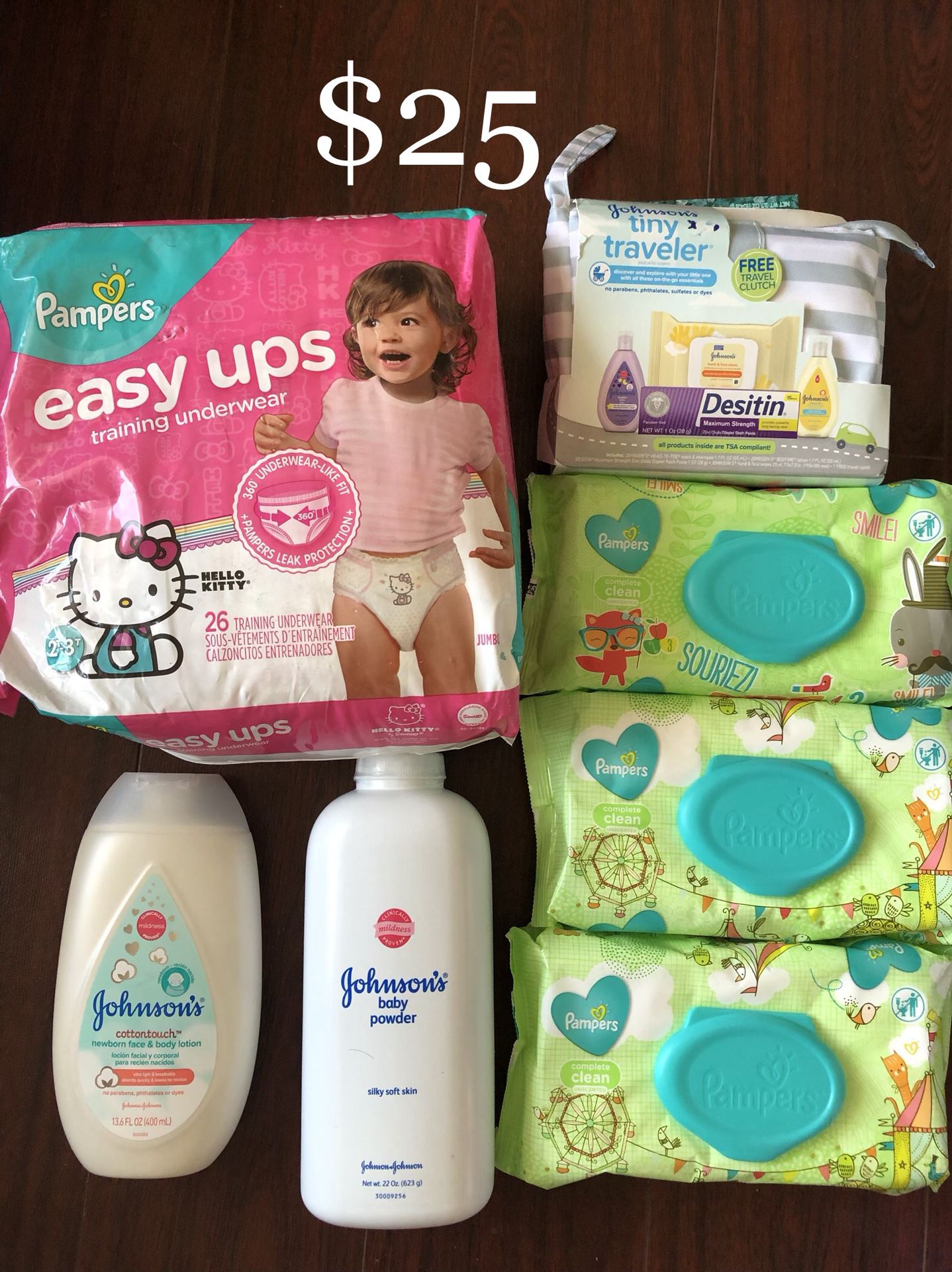 1 Pampers Diapers (2T-3T), 6 Johnson’s Baby: 3 Wet Wipes, 1 Tiny Traveler Essentials Bag (see pictures), 1 Baby Powder (large, 22 oz), 1 Cotton Touch