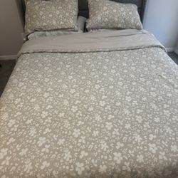 Queen size bed w box spring and mattress and storage underneath