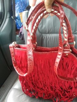 Red tassled hand bag