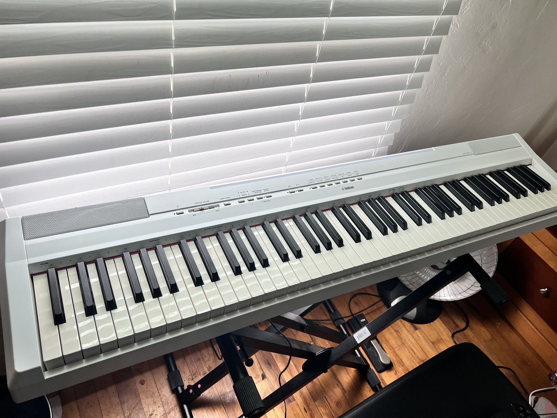 Yamaha P-115 white weighted 88-keyed piano with black stand, seat and sustain pedal