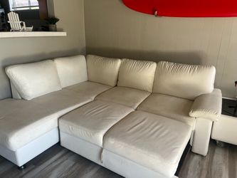 White leather couch and ottoman with pull out coastal farmhouse