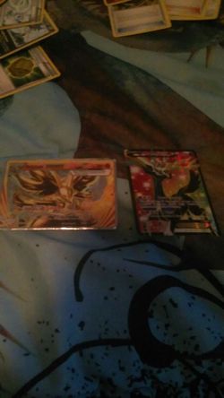 Pokemon cards 2 codes 1 break and 1 ex