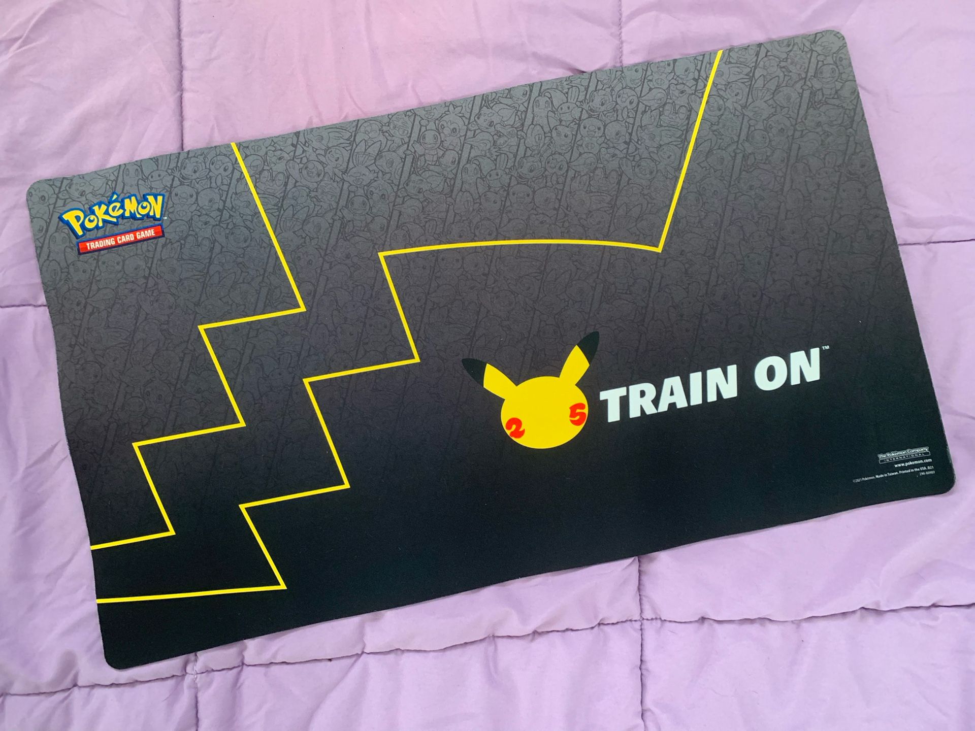 Official Pokémon 25th Anniversary “Train On” Mat
