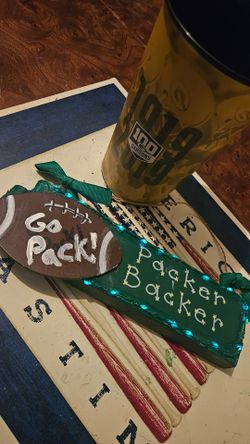 NFL GREEN BAY PACKERS, LED WOODEN HOLIDAY PACKER SIGN & "100 SEASON CUP, FIRM
