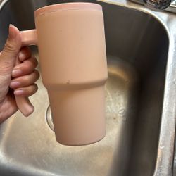 Pink cup with straw and handle