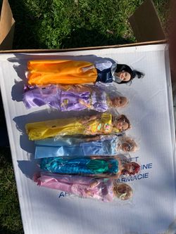 6 dolls in wrapper and box