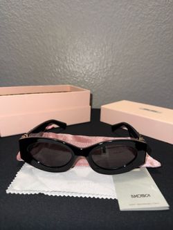 Luxury sunglasses (Miu Miu)