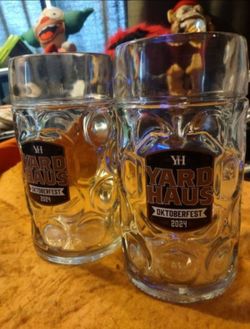 Two collectible glass beer mugs from octoberfest 2024  made from yard house will not separate
