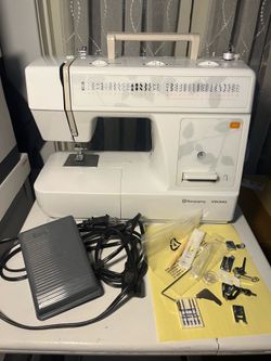 Husqvarna Viking E20 Sewing Machine (includes all accessories)