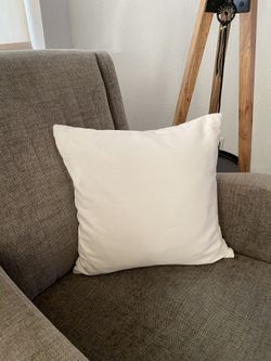 For Sale two pre-owned decorative soft solid white square throw pillow cushions.