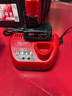 M12 Milwaukee charger with Redlithium XC 4.0 battery tabs are broken it still works good