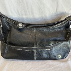 The SAK black leather shoulder bag / purse