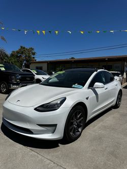 Tesla Model 3 White Sedan