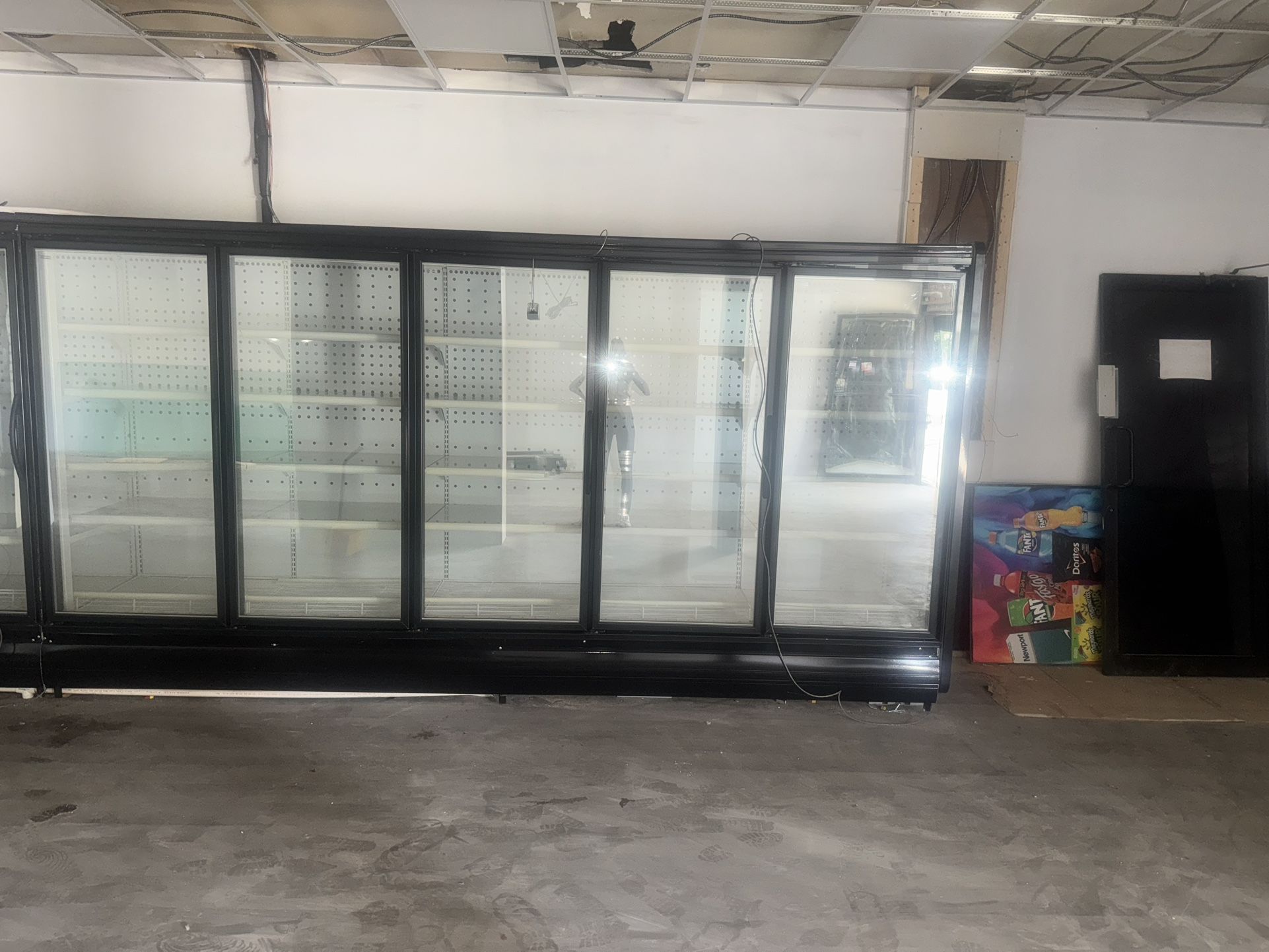 True 126 1/2" Four Section Supermarket Display Refrigerator, (4) Left Hinge Doors, Black, 208-240v