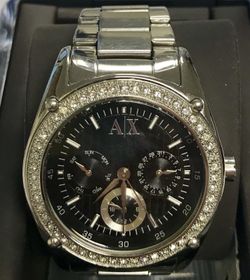 Brand NEW women’s Silver Armani Exchange watch. Box, watch case & extra links included. Asking $55