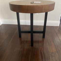 New 24”T x 24” W ashley Signature brown wood finish with black wooden legs end table/nightstand 