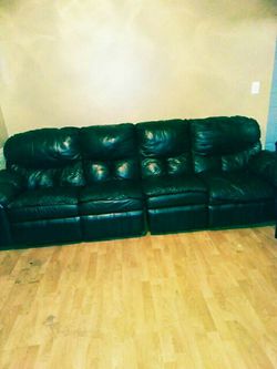Black leather reclining sectional