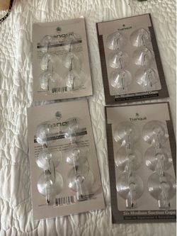 4 PACKAGES OF WINDOW SUCTION CUPS