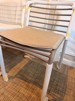 4 NEW Outdoor dining chairs