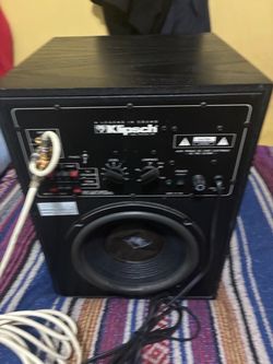 Klipsch SW8 II powered subwoofer (or a very closely related SW-series model like the SW8/SW10).