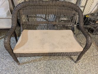 Rattan Outdoor Love Seat. Cushion Needs To Be Cleaned. Other Than That It's In Excellent Condition.