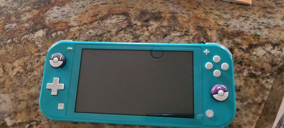 Nintendo Switch Lite  with charger and bootable sd chip READ DESCRIPTION