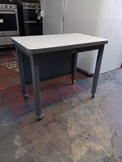 McDowell&Craig vintage tanker style table w/ casters