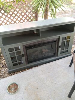 Entertainment center with fireplace