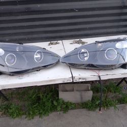 ACURA RSX YEAR 2002 TO 2004. PROJECTOR  HEADLIGHTS W/ HALO.
