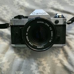 CANON AE-1 PROGRAM IN EXCELLENT CONDITON. ASKING $220 OR BEST OFFER