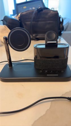Wireless charging base and alarm clock