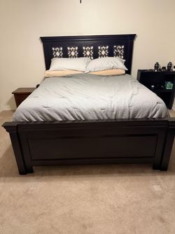 Bed and 2 dressers. 3 items total
