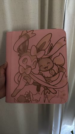 Four pocket pink top loader binder featuring Evee and sylveon