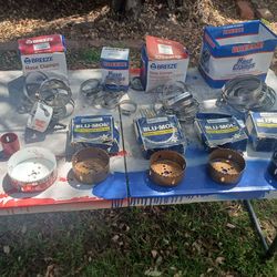 Assorted hole saws and hose clamps