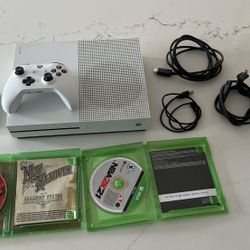 Xbox 1S game console with two games and accessories