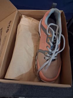 2 pairs of steel toe sneakers