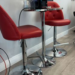 Red Swivel Adjustable Barstools And High top Metal Table (trio)