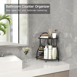 Two black 2 tier counter organizers