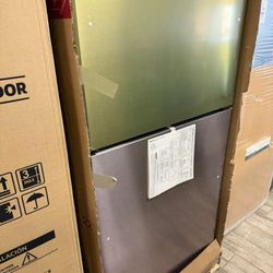 Ge profile stainless steel top Bottom fridge new with warranty handles inside 