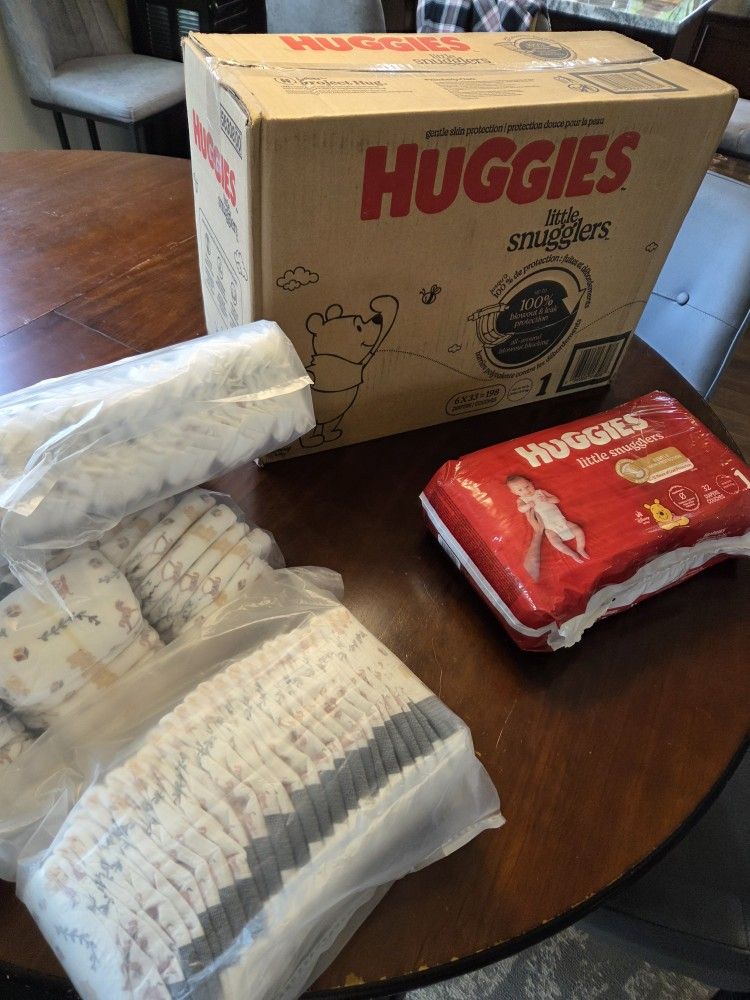 Size 1 Diapers And Playpen 