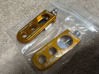 Bullseye chain tensioners