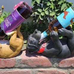 Figurines Holding Wine Bottle