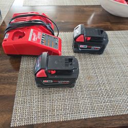 Milwauke Batteries And Charger.