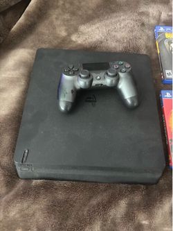 PS4 slim w/ controller and games