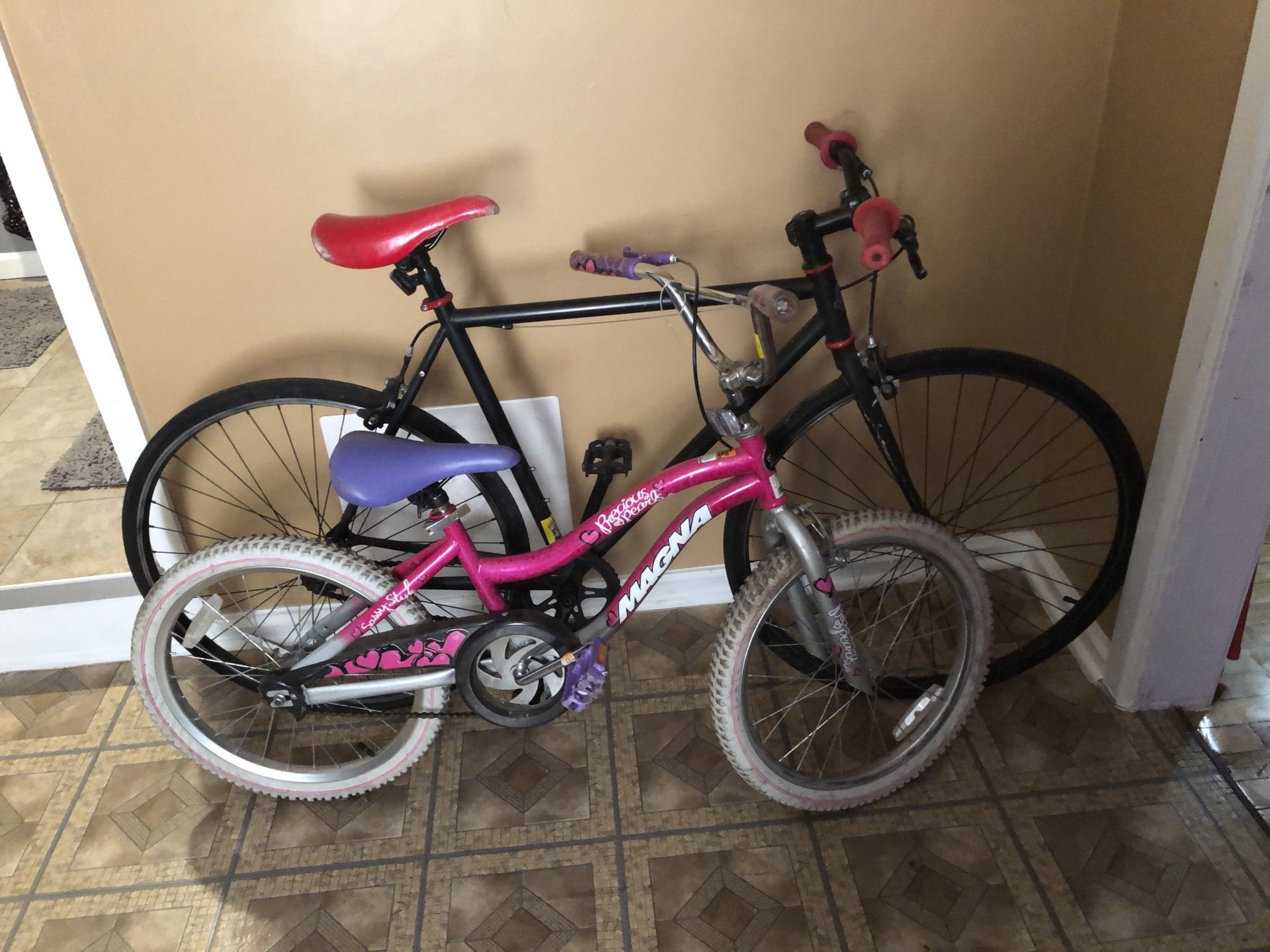 Fixie bike and small girl bike