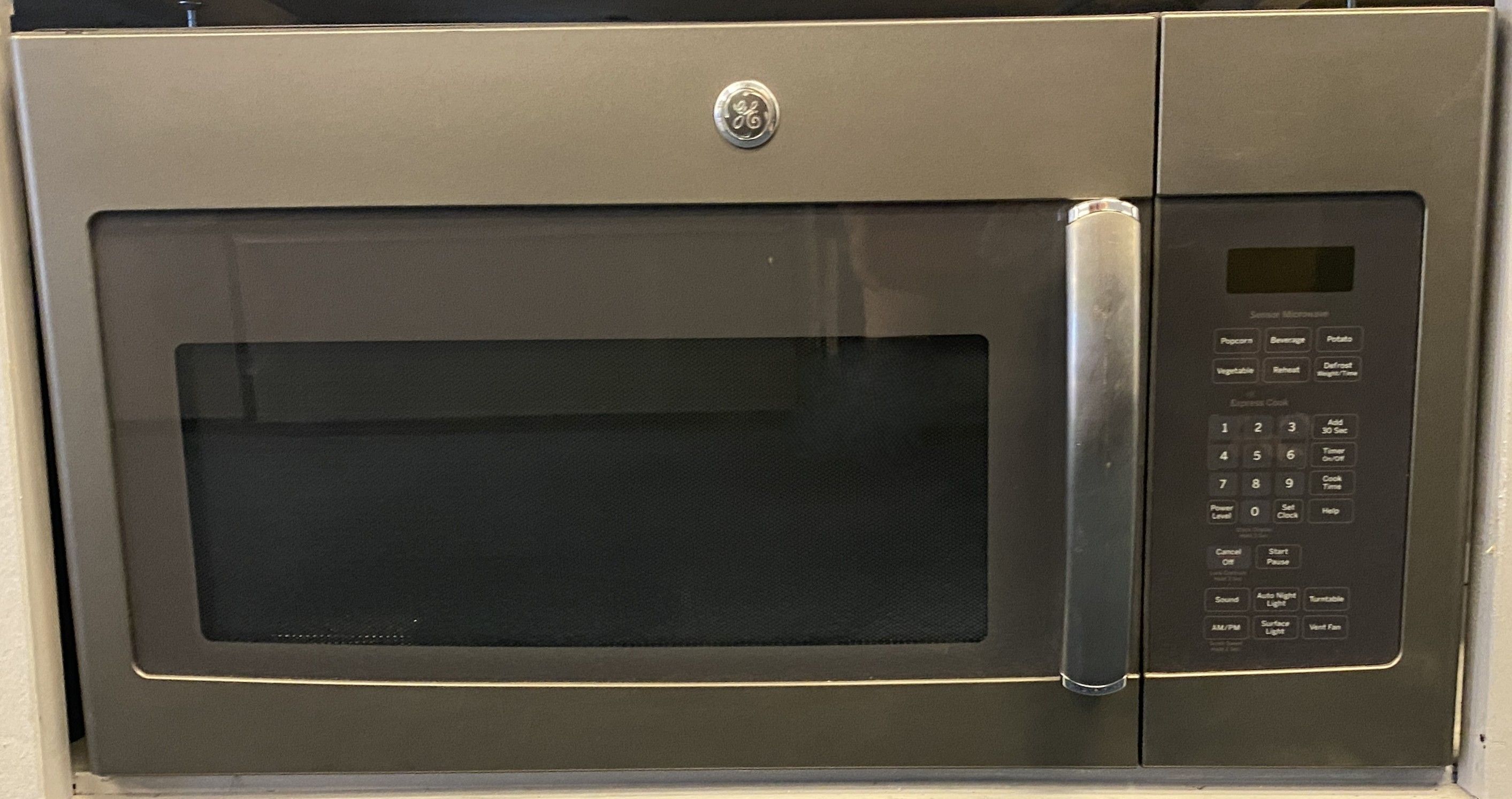 Black Stainless Steel GE Over The Range Microwave (8-0070)
